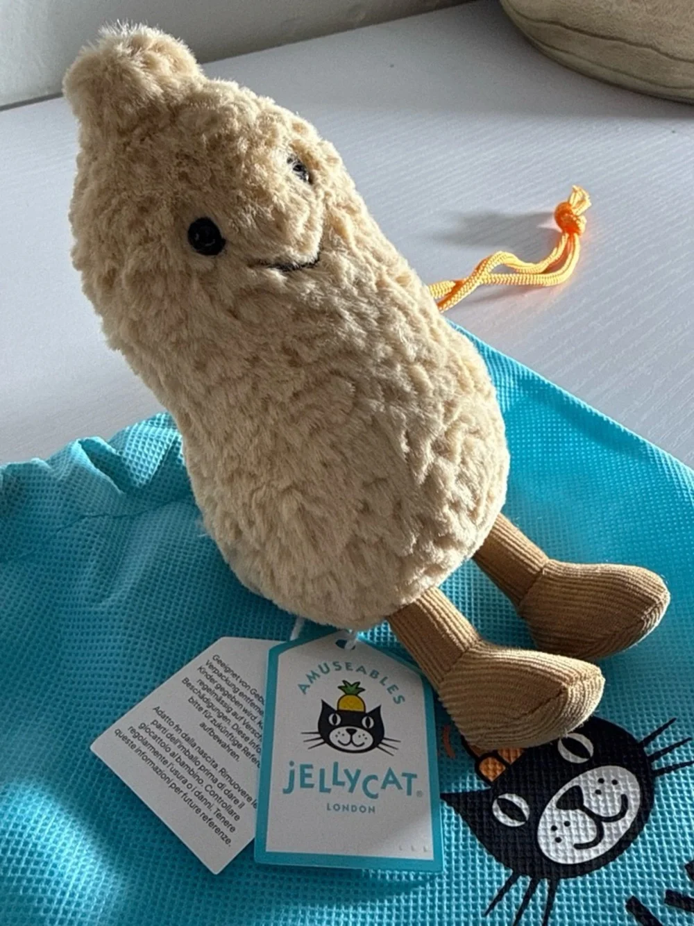 Jellycat Cream Plush Amuseables with Tan Corded Legs